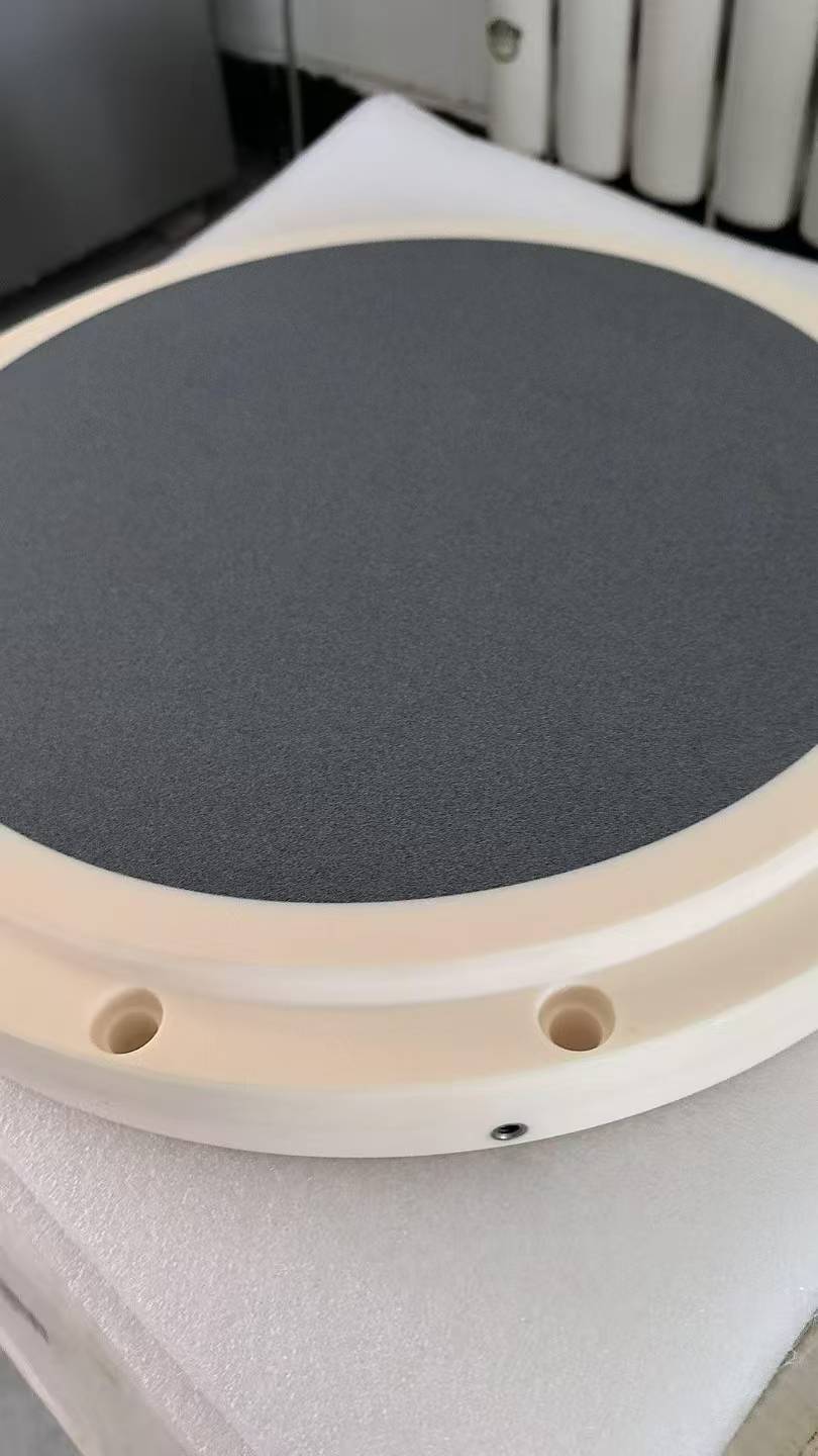 Porous ceramic vacuum chuck table